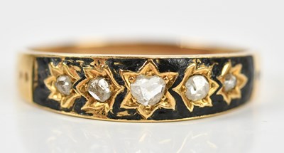 Lot 441 - A Victorian black enamel and yellow metal...
