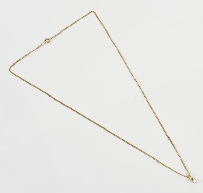 Lot 266 - An 18ct yellow gold diamond pendant with...