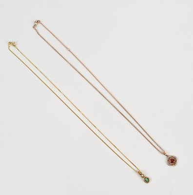 Lot 269 - A 9ct yellow gold diamond and emerald set drop...