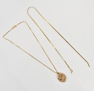 Lot 270 - A 9ct yellow gold locket, suspended on a box...