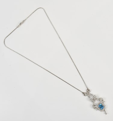 Lot 240 - A white metal diamond and aquamarine pendant,...
