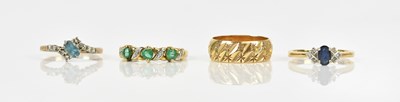 Lot 445 - A 9ct yellow gold wedding band and three...