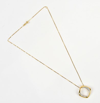 Lot 256 - A yellow metal diamond set pendant stamped...