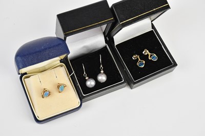 Lot 185 - A pair of 9ct yellow gold and opal set ear...