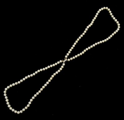 Lot 299 - A pearl necklace with 9ct gold clasp and a two...