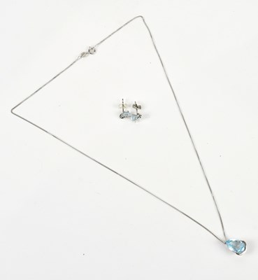 Lot 290 - A white metal mounted pear shaped aquamarine,...