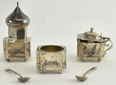Lot 1143 - An Indian white metal and niello work...
