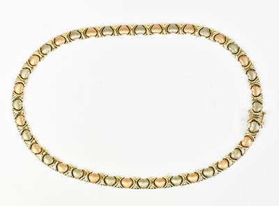 Lot 1435 - A 14ct three-colour gold necklace, with yellow...