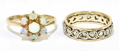 Lot 1130 - A 9ct yellow gold and opal floral cluster ring,...