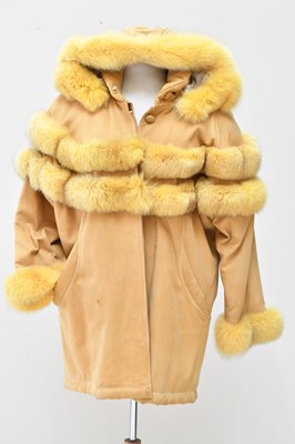 Lot 730 - An unusual tan suede leather short coat with...