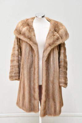 Lot 699 - A knee length light brown  mink coat with a...