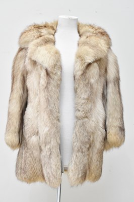 Lot 700 - An arctic brown and cream fox fur short jacket,...