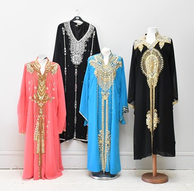 Lot 721 - RUDALI; four crepe kaftans, all heavily...