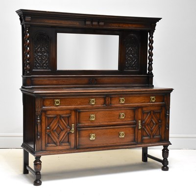 Lot 1073 - An early 20th century oak mirror sideboard,...