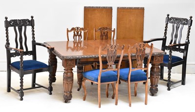 Lot 1154 - A Victorian carved oak extending dining table...