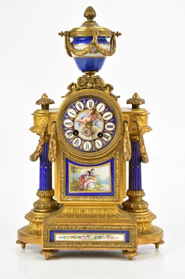 Lot 1312 - A 19th century ormolu and porcelain mantel...