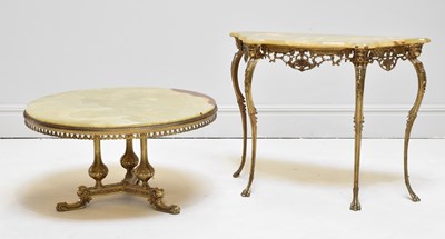 Lot 1109 - A brass serpentine fronted console table with...