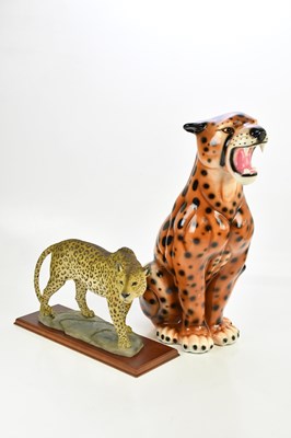 Lot 2511 - A large ceramic model of a seated leopard,...