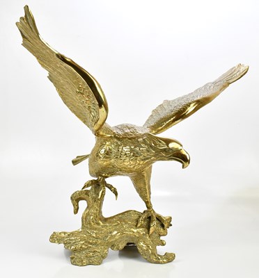 Lot 1561 - A large decorative brass model of an eagle...
