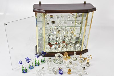 Lot 2381 - A modern hanging display cabinet housing a...