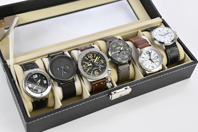 Lot 621 - A collection of six fashion watches including...
