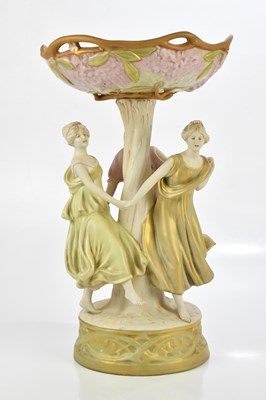 Lot 2420 - ROYAL DUX; a figural centrepiece, decorated...