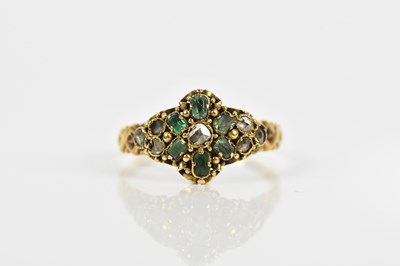 Lot 480 - A yellow metal, diamond and green stone dress...