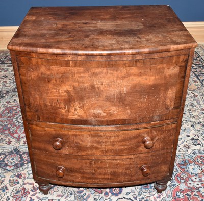 Lot 2835 - A George III mahogany commode, with two doors,...
