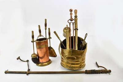 Lot 1567 - A collection of brass and copperware,...