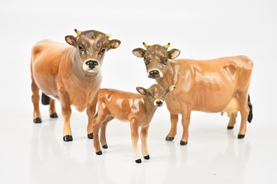 Lot 2525 - BESWICK; a group of three Jersey cows (3).