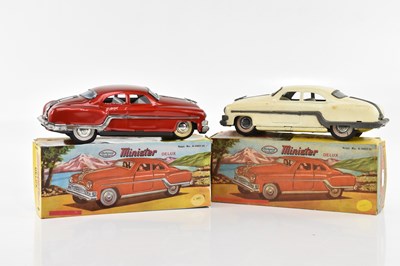 Lot 2001 - Two boxed Minster Deluxe model cars, one red,...