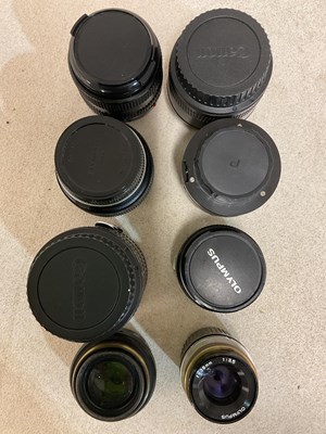 Lot 25 - A small quantity of lenses, various makers to...