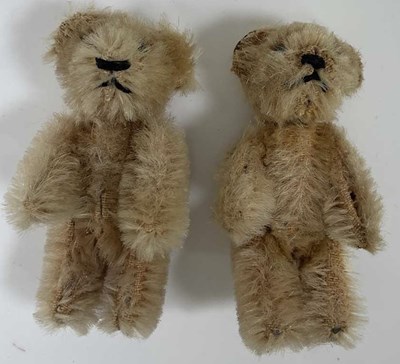 Lot 137 - SCHUCO; two gold plush miniature teddy bears,...