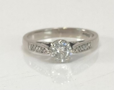 Lot 490 - An 18ct white gold diamond solitaire ring, the...
