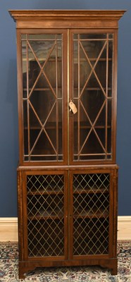 Lot 2739 - A Regency style display cabinet, with two...