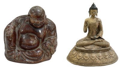 Lot 1050 - An early 20th Chinese gilt metal figure of...