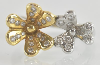 Lot 1210 - An 18ct yellow and white gold diamond set...