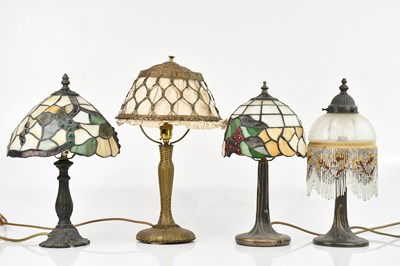 Lot 1684 - A French gilt metal table lamp, with basket...