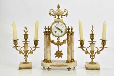 Lot 1310 - A 19th century French gilt brass and marble...