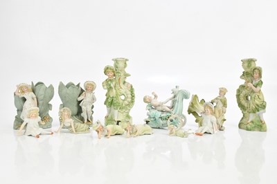 Lot 2508 - Twelve Continental bisque figures and vases,...