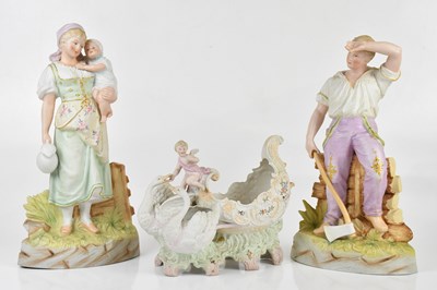 Lot 2455 - A pair of Continental bisque figures of a male...