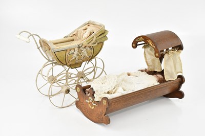 Lot 2084 - BABY WENDY'S CRADLE; a doll's cradle with...