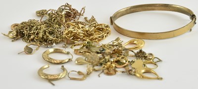Lot 1197 - A quantity of assorted scrap 9ct and yellow...