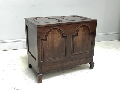 Lot 1035 - An early 20th century panelled oak coffer, on...
