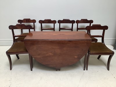 Lot 1261 - A 19th century mahogany drop-leaf dining table,...
