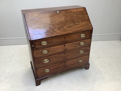 Lot 1082 - A George III mahogany bureau, with fall front...