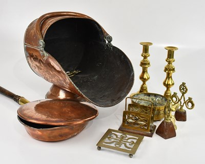 Lot 1574 - A copper coal scuttle, with a brass fire kerb...