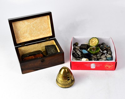 Lot 216 - A collection of over sixty thimbles to include...