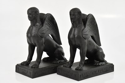 Lot 2537 - WEDGWOOD; a pair of black basalt models of...