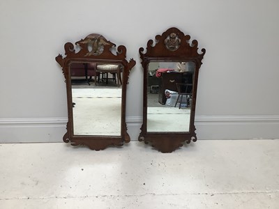 Lot 1047 - Two 18th century style walnut fret framed wall...